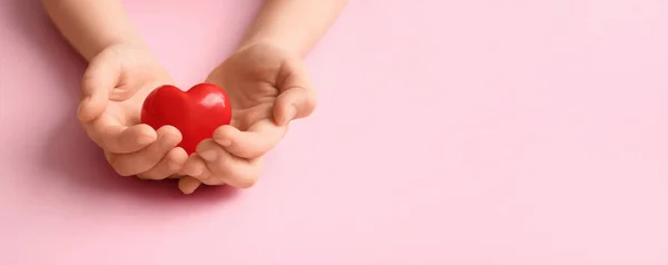 Child Hands Red Heart Pink Background Space Text — Stock Photo, Image