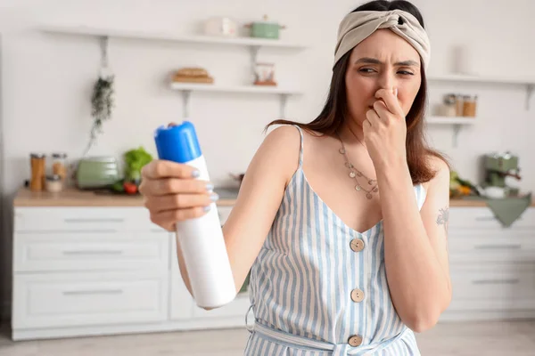 Displeased Young Woman Air Freshener Kitchen — Stock Photo, Image
