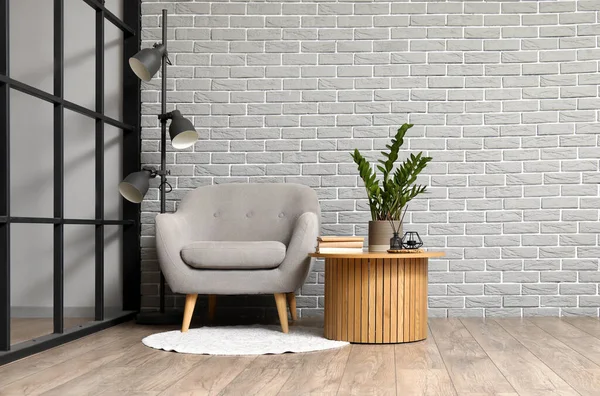 Cozy Armchair Houseplant Coffee Table Grey Brick Wall — Stock Photo, Image