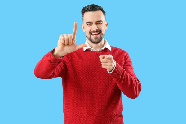 Handsome Man Showing Loser Gesture Blue Background — Stock Photo, Image