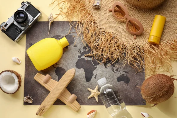 Composition World Map Bottle Sunscreen Cream Wooden Plane Straw Hat — Stock Photo, Image