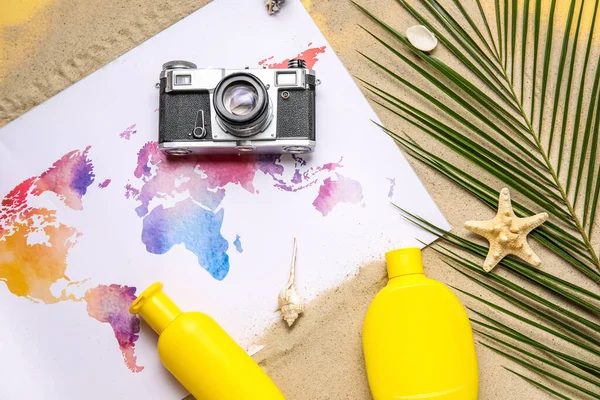 Composition World Map Bottles Sunscreen Cream Photo Camera Seashells Sand — Stock Photo, Image