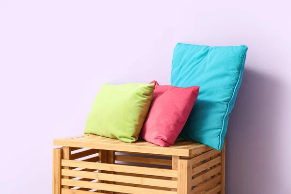Stylish Pillows Wooden Drawer Lilac Wall — Stock Photo, Image