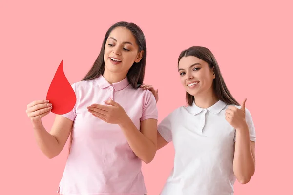 Doadores Sexo Feminino Com Gota Sangue Papel Fundo Rosa — Fotografia de Stock