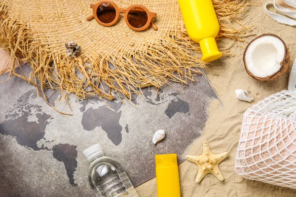 Composition World Map Bottle Sunscreen Cream Straw Hat Sunglasses Sand — Stock Photo, Image