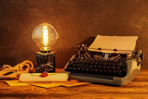 Vintage Typewriter Glowing Lamp Scroll Wax Seal Wooden Table — Stock Photo, Image
