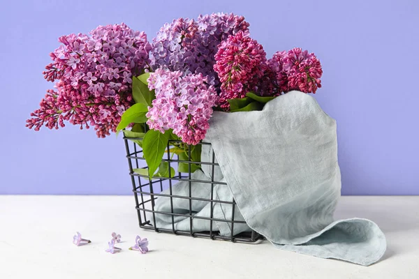 Basket Blooming Lilac Branches Table Color Background — Stock Photo, Image
