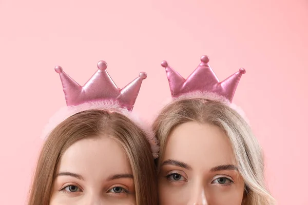 Young Sisters Crowns Pink Background Closeup — Stock Photo, Image