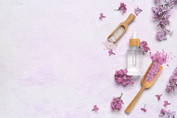 Composition Bottle Lilac Essential Oil Spoons Sea Salt Flowers Light — Stock Photo, Image