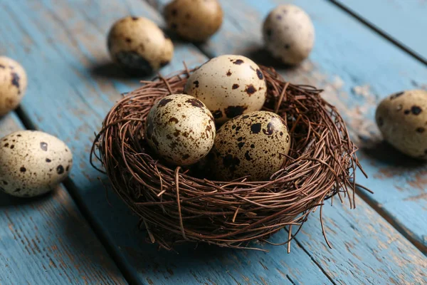 Nest Fresh Quail Eggs Blue Wooden Background — Stock Photo, Image