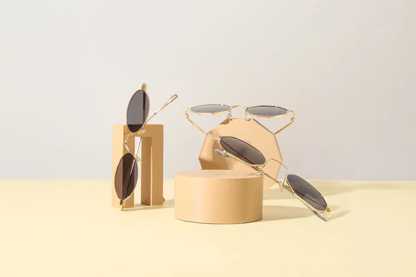 Podiums Different Stylish Sunglasses Light Table — Stock Photo, Image