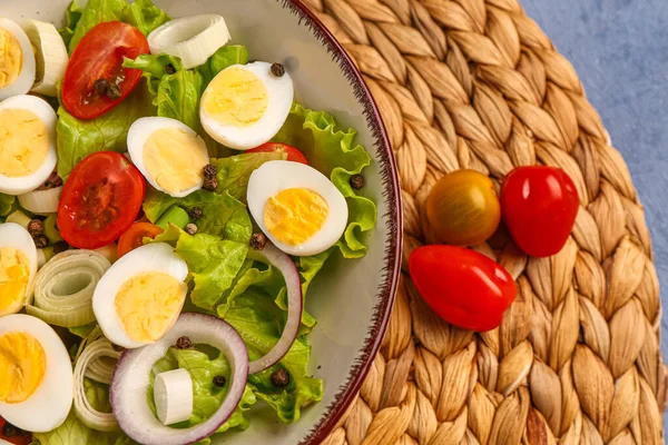 Tasty Salad Quail Eggs Tomatoes Onion Lettuce Blue Background Closeup — Stock Photo, Image