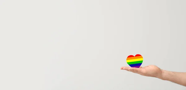 Hand Holding Rainbow Heart Light Background Space Text Pride Month — Stock Photo, Image