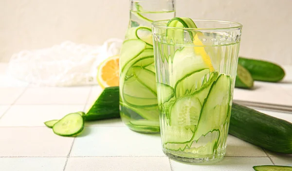 Glass Bottle Cucumber Infused Water Light Table Closeup — Stock Photo, Image