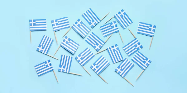 Muitas Bandeiras Papel Grécia Fundo Azul Claro — Fotografia de Stock