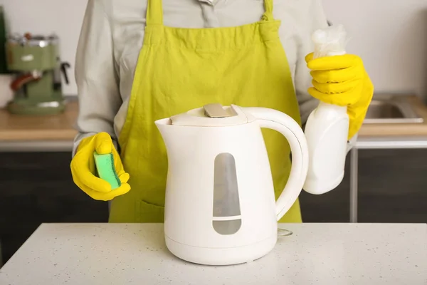 Woman Yellow Gloves Cleaning Electric Kettle White Table — Stock Photo, Image