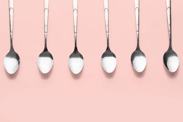 Stainless Steel Spoons Pink Background — Stock Photo, Image