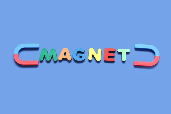 Patkó Alakú Mágnesek Szó Magnet Kék Alapon — Stock Fotó