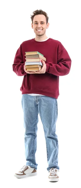 Junger Mann Mit Einem Stapel Bücher Auf Weißem Hintergrund — Stockfoto