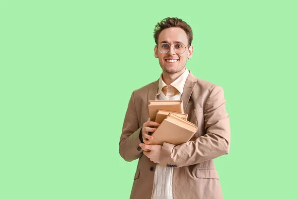 Young Man Books Green Background — Stock Photo, Image