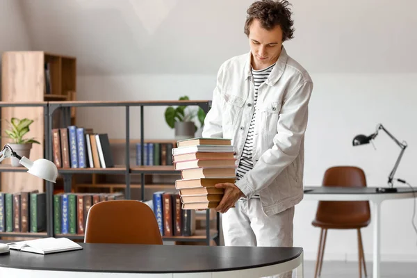 Young Man Stack Books Library — Stock Photo, Image