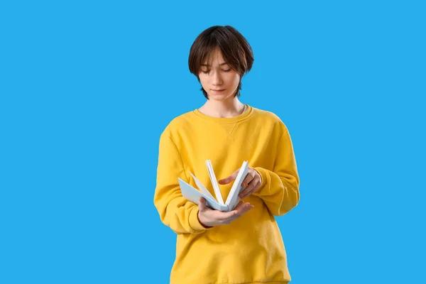 Teenage Boy Reading Book Blue Background — Stock Photo, Image