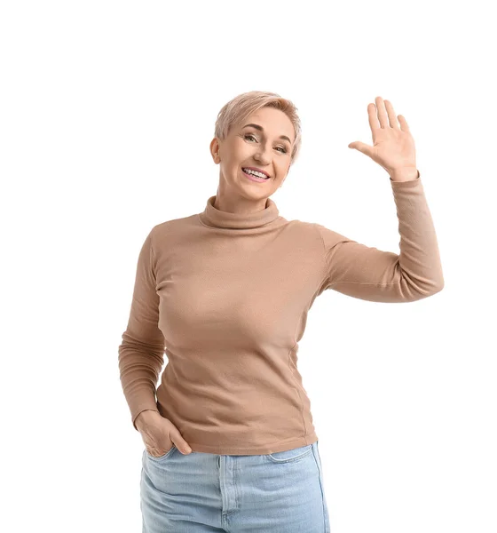 Stijlvolle Volwassen Vrouw Zwaaien Hand Witte Achtergrond — Stockfoto