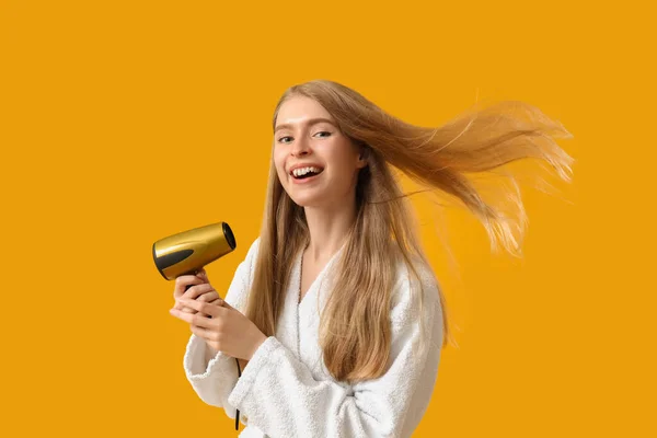 Young Blonde Woman Hair Dryer Yellow Background — Stock Photo, Image