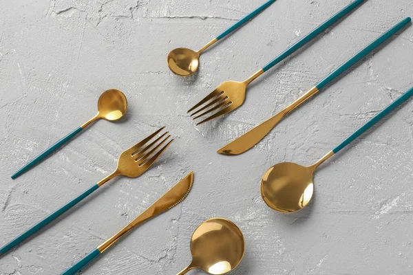 Golden Set Cutlery Green Handles Grey Background — Stock Photo, Image