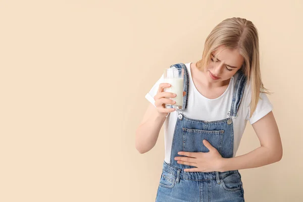 Displeased Young Woman Lactose Intolerance Beige Background — Stock Photo, Image