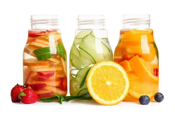 Bottles Infused Water Different Sliced Fruits White Background — Stock Photo, Image
