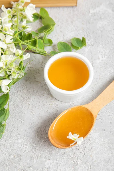 stock image Composition with sweet honey and acacia flowers on light background, closeup