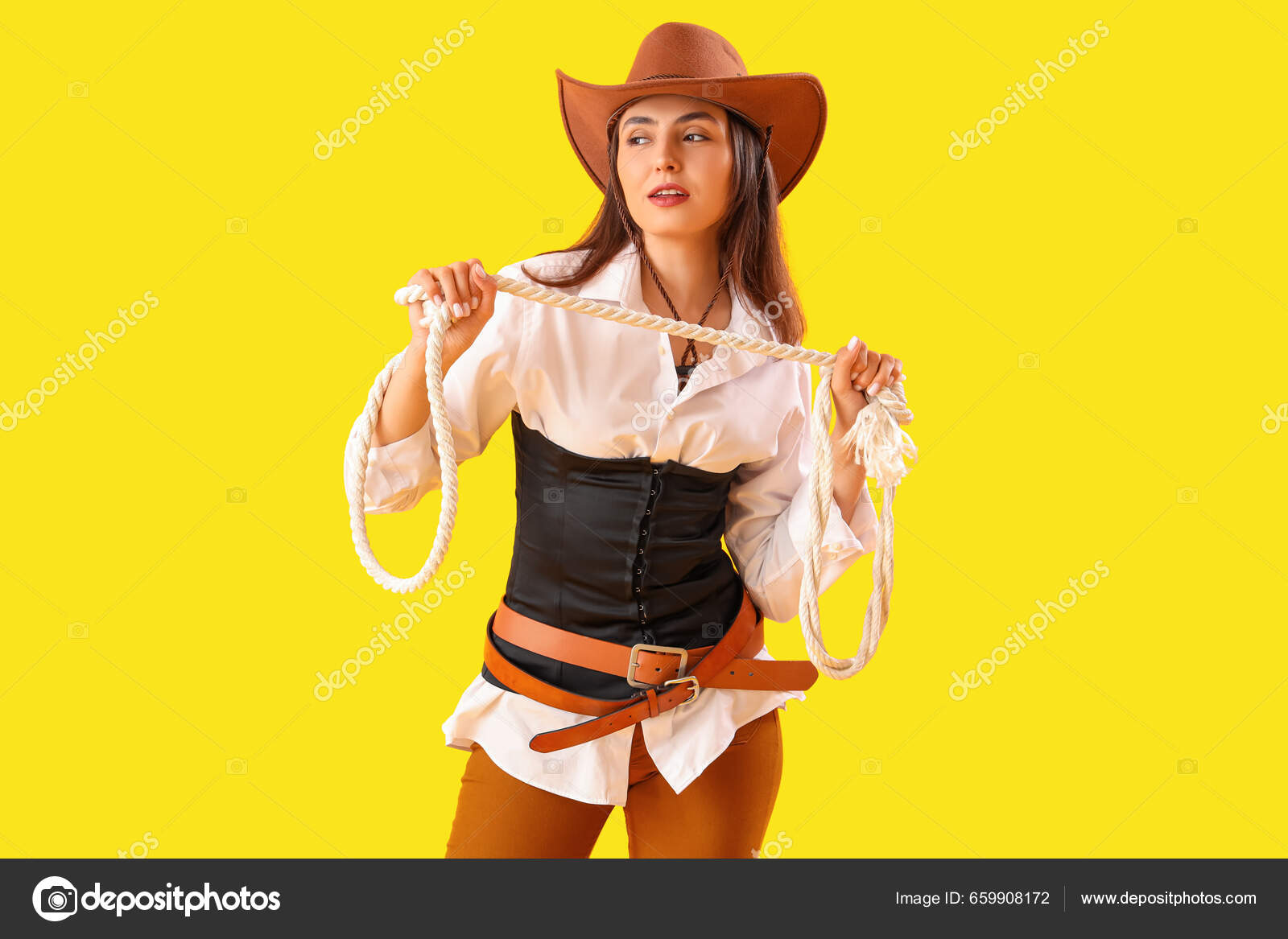 Beautiful Cowgirl Lasso Yellow Background Stock Photo by ©serezniy