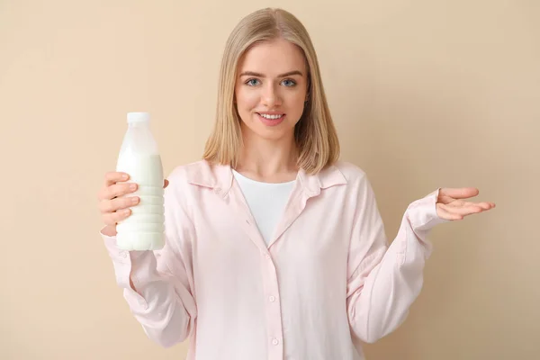 Beautiful Young Woman Bottle Milk Beige Background — Stock Photo, Image