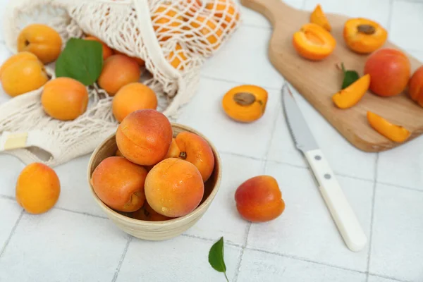 Board Bowl Fresh Apricots White Tile Table — Stock Photo, Image