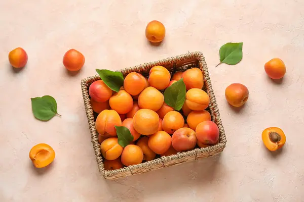 Wicker Box Fresh Apricots Beige Background — Stock Photo, Image