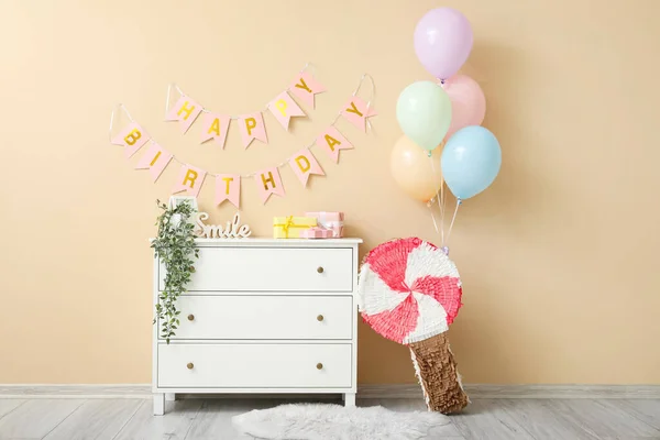 Chest Drawers Pinata Balloons Garland Beige Wall Living Room Decorated — Stock Photo, Image