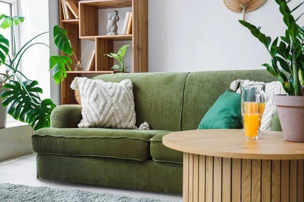 Stylish Living Room Cozy Green Sofa Jug Orange Juice Coffee — Stock Photo, Image