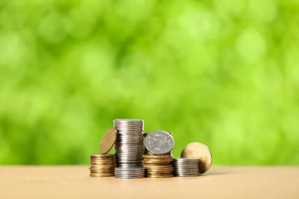 Stacks Coins Table Blurred Green Nature Background — Stock Photo, Image