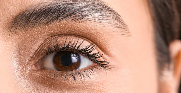 Woman Brown Eyes Closeup — стоковое фото