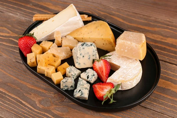 Tray Pieces Tasty Cheese Wooden Background — Stock Photo, Image