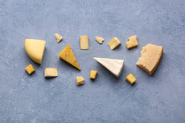 Pieces Tasty Cheese Grey Background — Stock Photo, Image