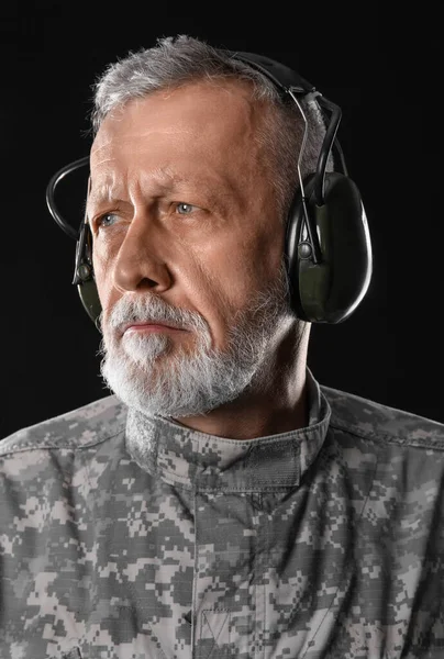 Mature Soldier Headphones Dark Background Closeup — Stock Photo, Image