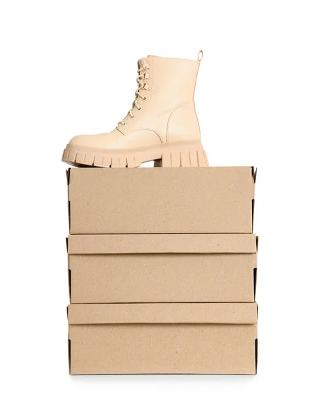 Cardboard Boxes Stylish Beige Boot White Background — Stock Photo, Image