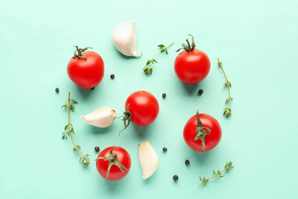 Composition Ripe Cherry Tomatoes Thyme Garlic Peppercorn Turquoise Background — Stock Photo, Image