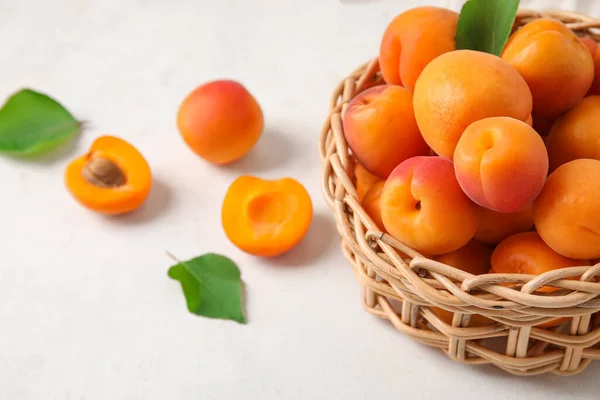 Wicker Bowl Fresh Apricots White Table — Stock Photo, Image