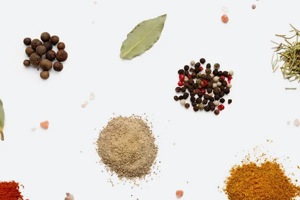 stock image Heaps of aromatic spices on light background