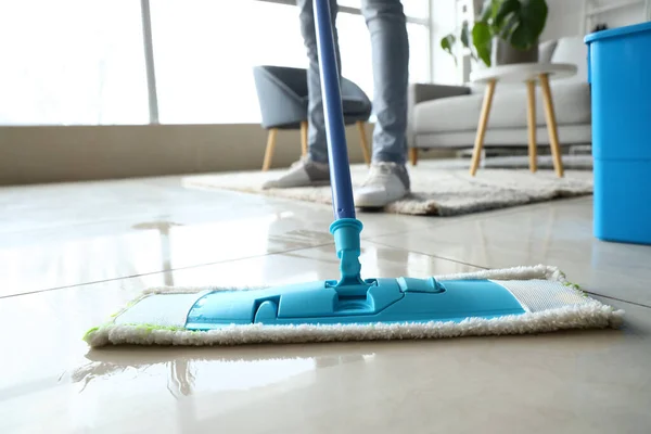 Male Janitor Mopping Floor Living Room Closeup — Stock Photo, Image