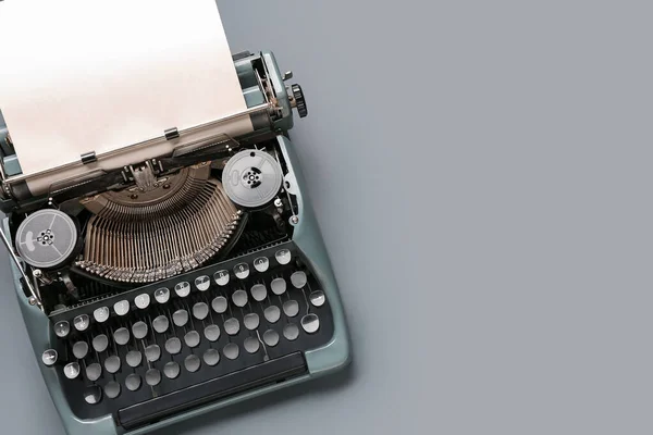Vintage Typewriter Blank Paper Sheet Grey Background Royalty Free Stock Images