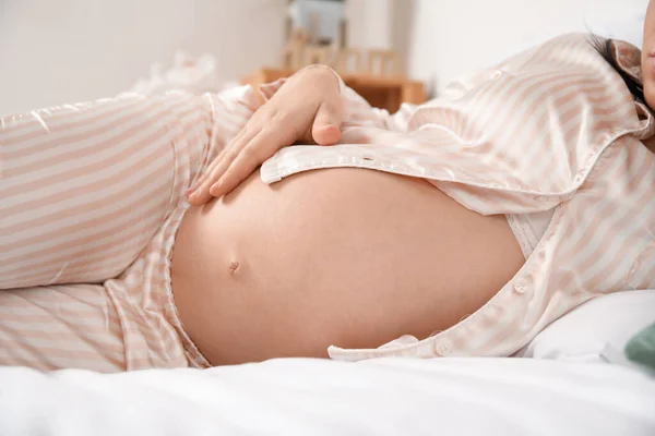 Young Pregnant Woman Lying Bedroom Closeup — Stock Photo, Image